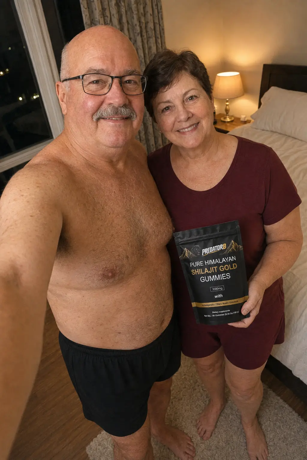 Older couple smiling with their PREDATOR8 pouch at bedtime