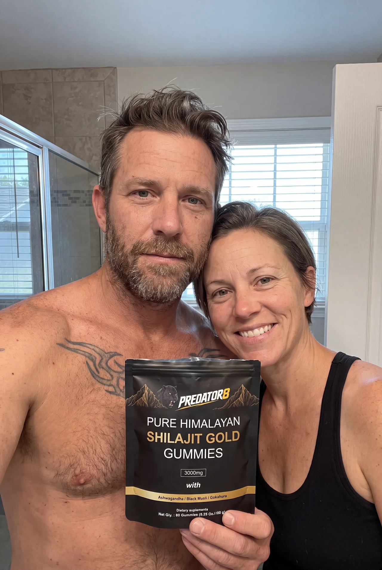 Tom and Lisa holding a PREDATOR8 pouch together